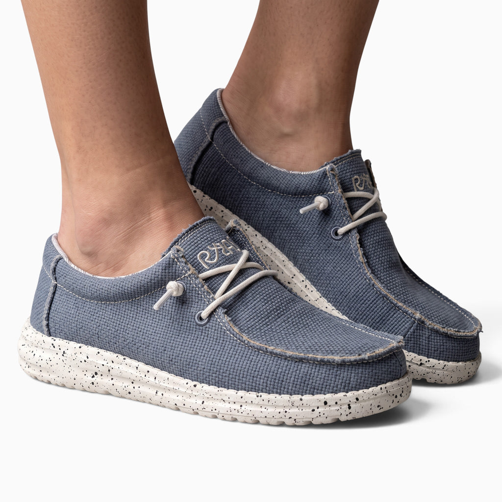 Mocassin Paris en toile bleue pour homme avec semelle souple blanche tachetée, style décontracté et léger