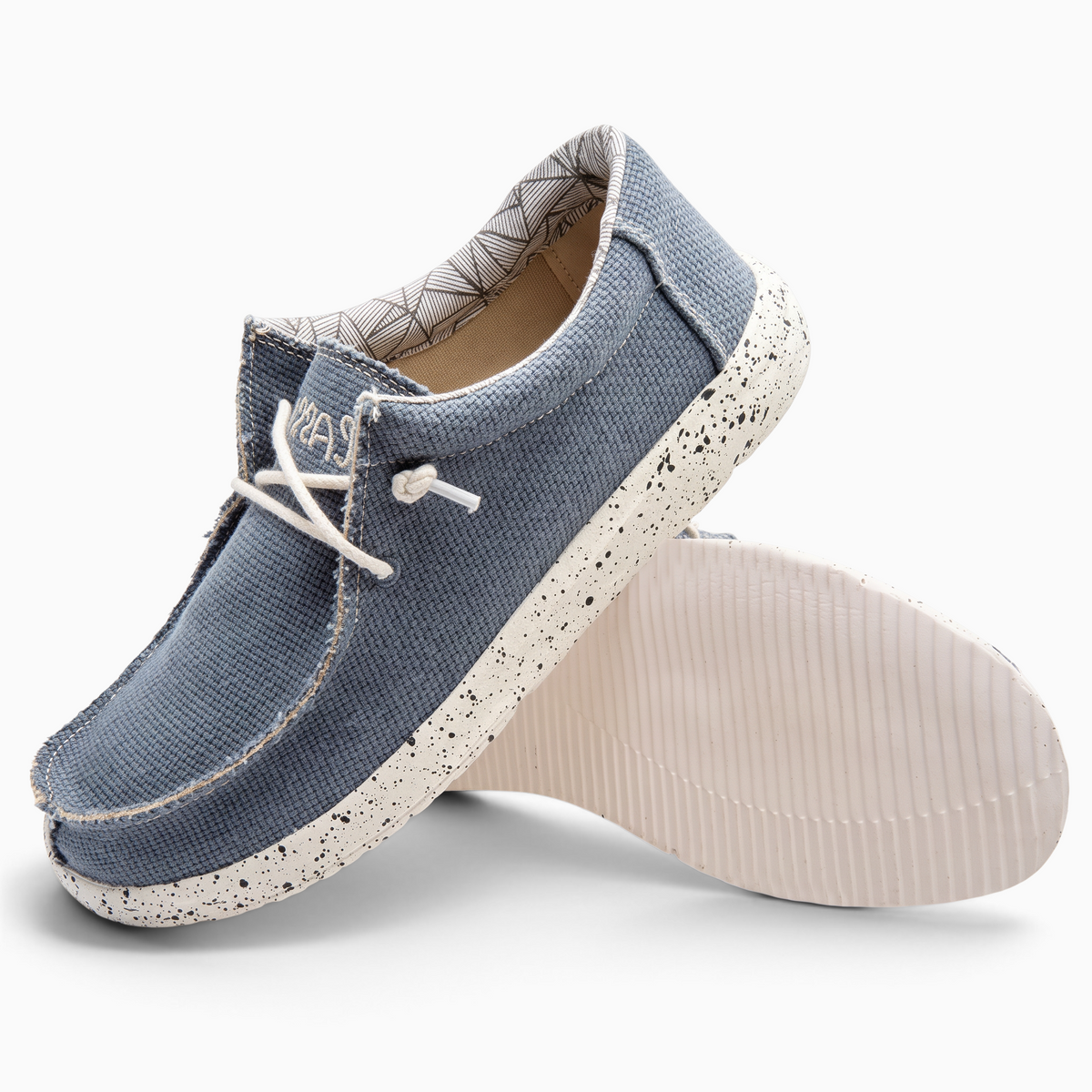 Mocassin Paris en toile bleue pour homme avec semelle souple mouchetée et lacets blancs pour un style décontracté
